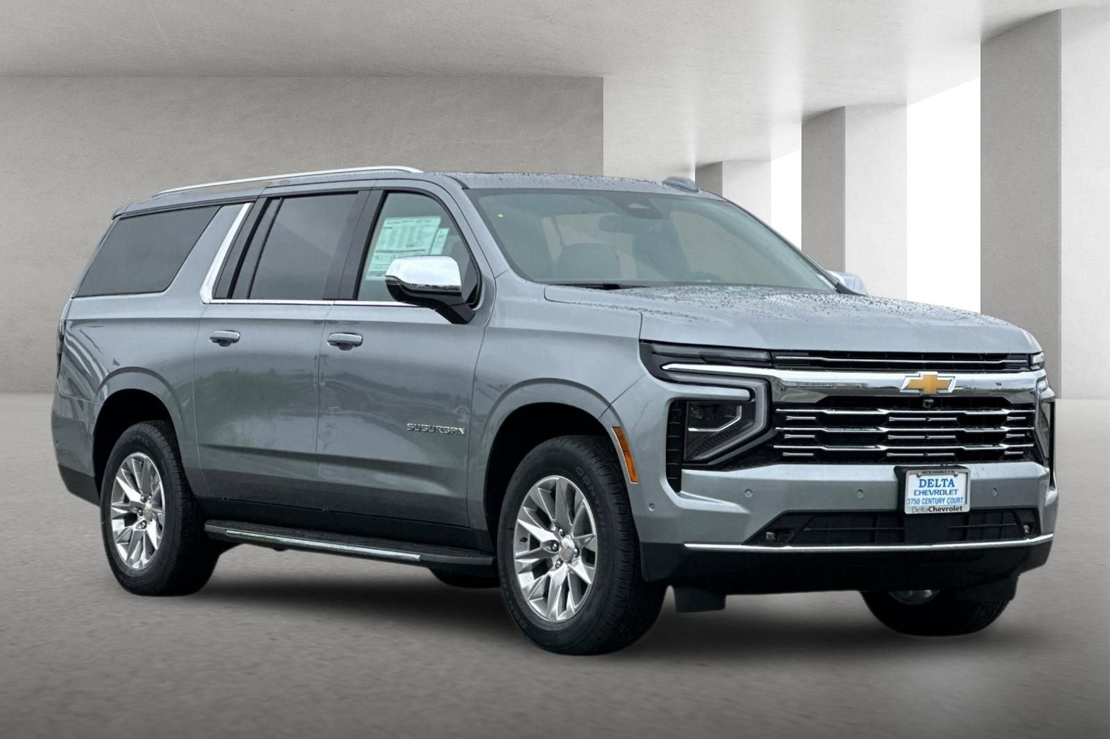 2026 Chevrolet Suburban Premier in Sterling Gray Metallic — front three-quarter view