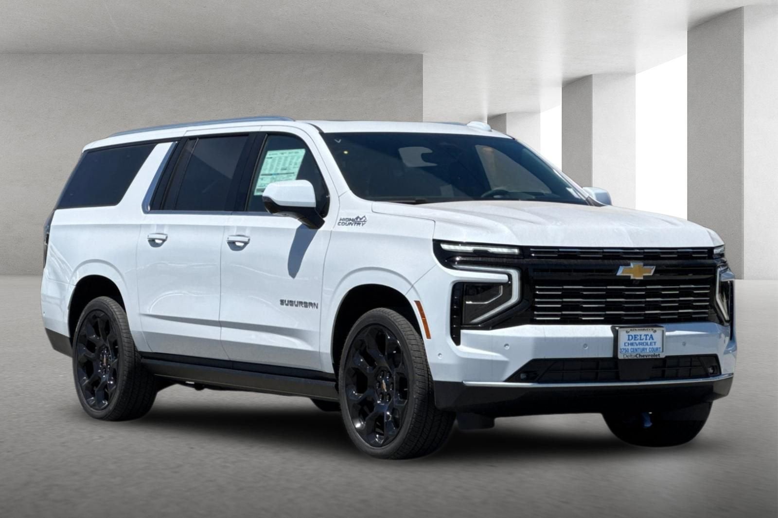 2026 Chevrolet Suburban High Country in Polar White Tricoat — front three-quarter view