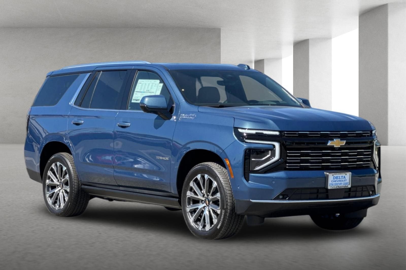 2026 Chevrolet Tahoe High Country in Lakeshore Blue Metallic — front three-quarter view