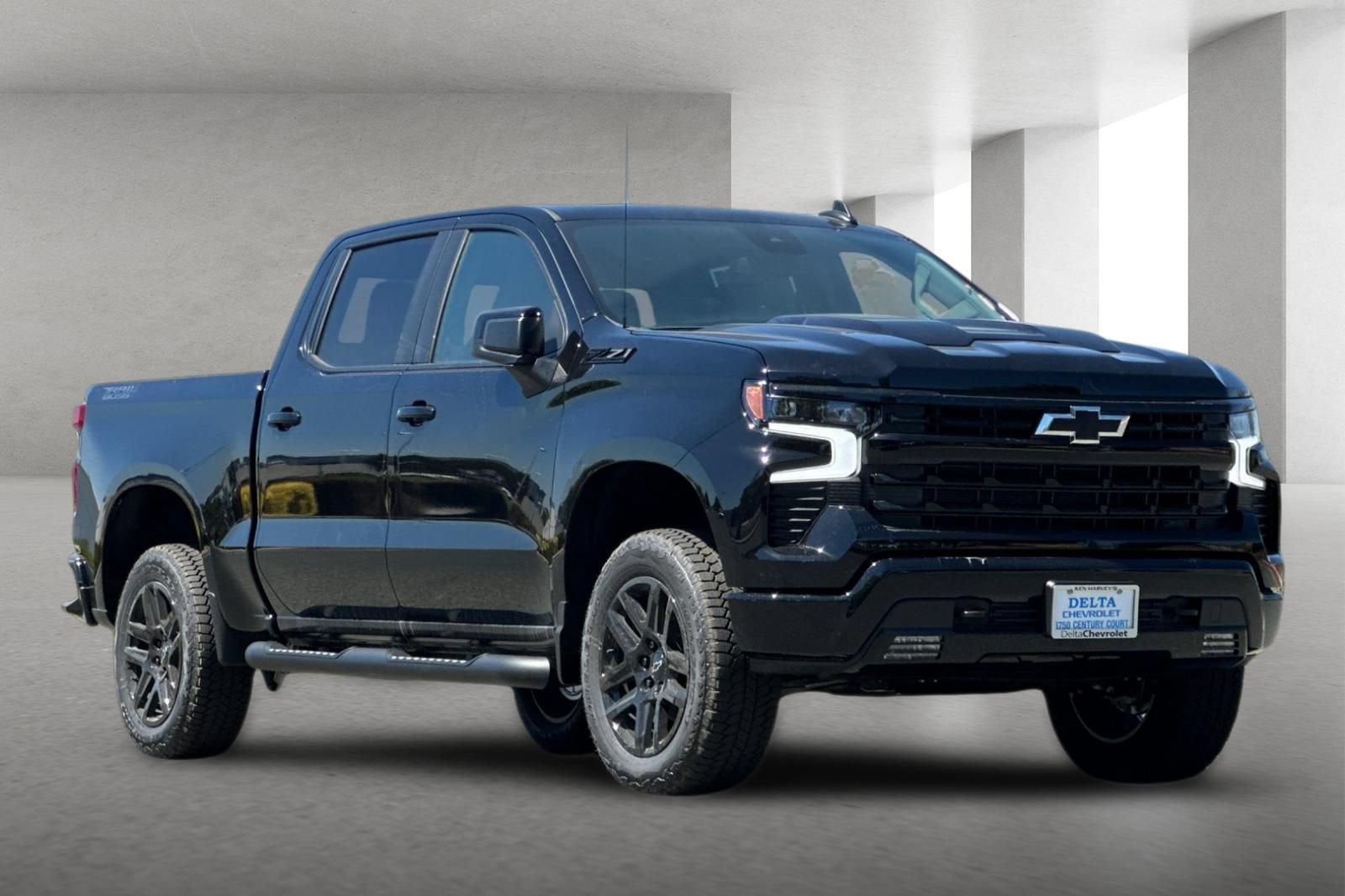 2026 Chevrolet Silverado 1500 LT Trail Boss in Black — front three-quarter view